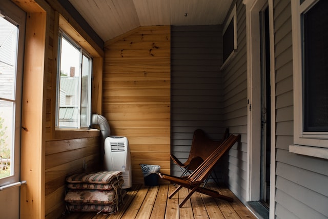 brown chair on wooden porch